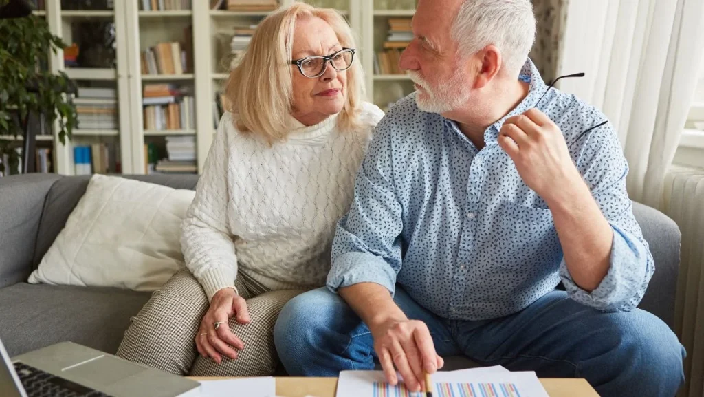 retired-senior-couple-planning-retirement-and-retirement