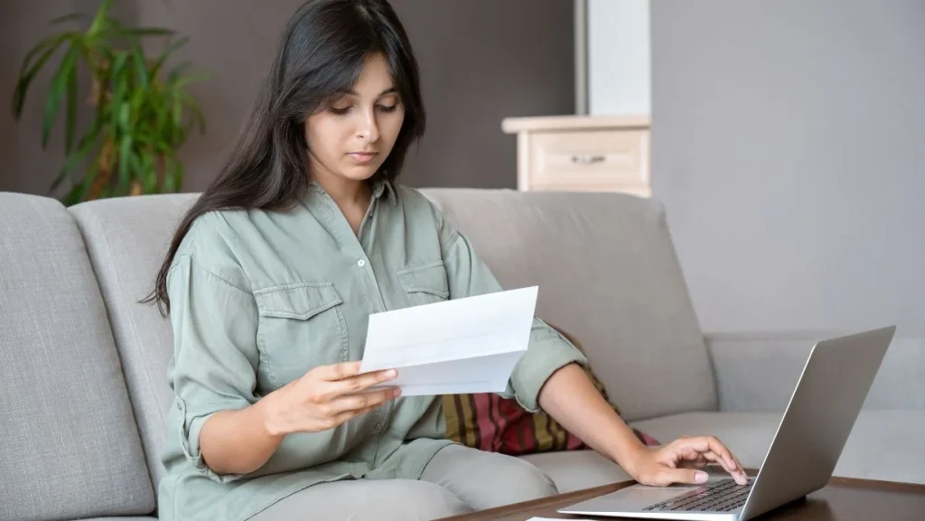 woman-paying-bills-online-at-home
